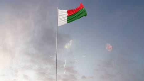 bandera de madagascar con fuegos artificiales en el fondo