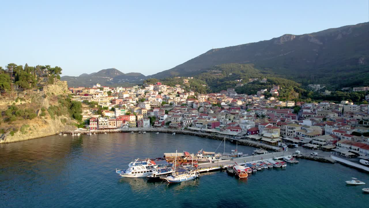 Aerial View of a Picturesque Coastal Town with a Harbor and Boats