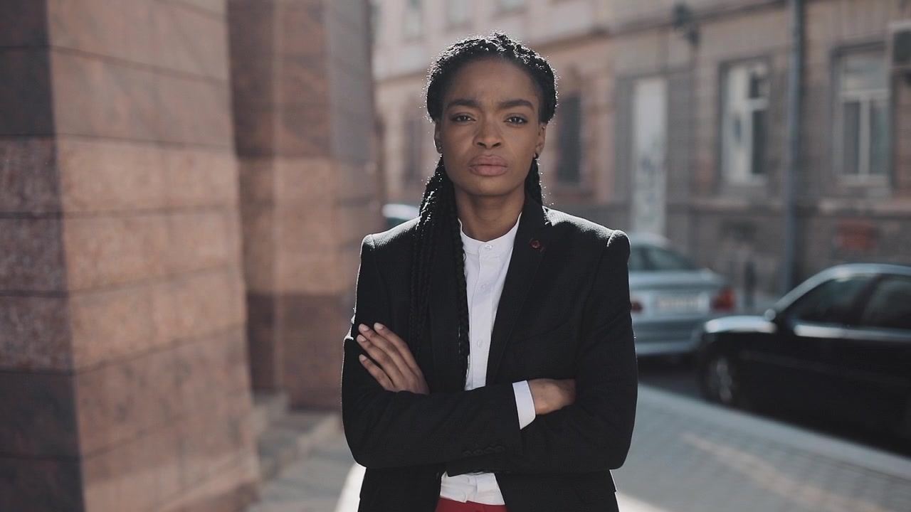 Confident Businesswoman Standing Outdoors in City