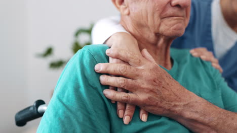 holding hands, senior and woman with wheelchair