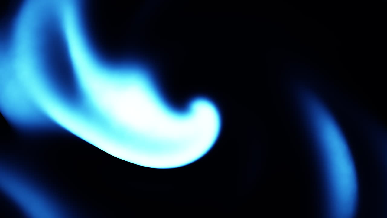 Blazing blue spiral mesmerizing motion on black canvas