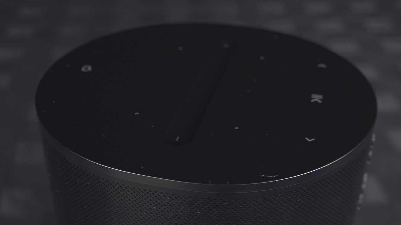 Close up view of the Sonos Era 100 on a rotating table