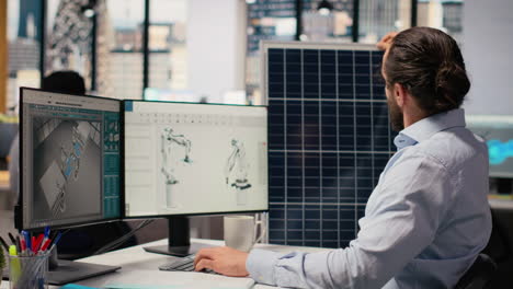 sustainability rd expert uses cad program on pc to design solar panels