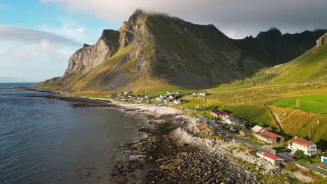 vikten village and rough coastline at lofoten islands in norway, scandinavia - aerial circling