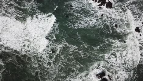 Rocky-Coast-With-Rough-Seas-Aerial-Flyover