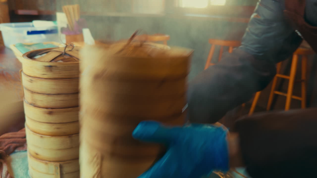 Steaming bamboo baskets in a restaurant kitchen in Wuzhen, China, as food is prepared