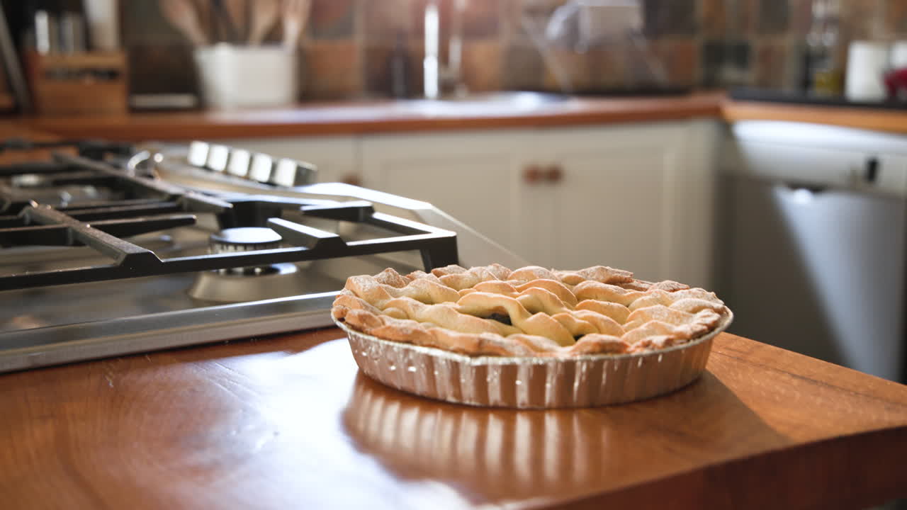 Freshly baked pie cooling on kitchen counter, ready for family gathering