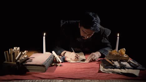 Medieval-man-writing-letters.-Historical-video.