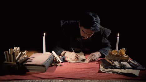 medieval man writing letters. historical video.