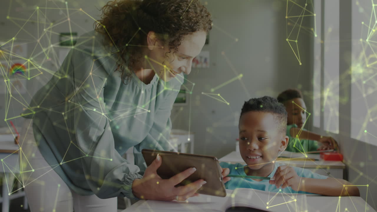 Animated video shows tech-savvy teacher and student interacting in a classroom.