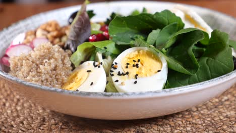 healthy quinoa salad with eggs and vegetables