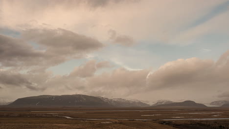 amazing cloudscape and view of the vajnajokull glacier in iceland - timelapse