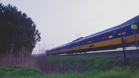 train passing through rural countryside