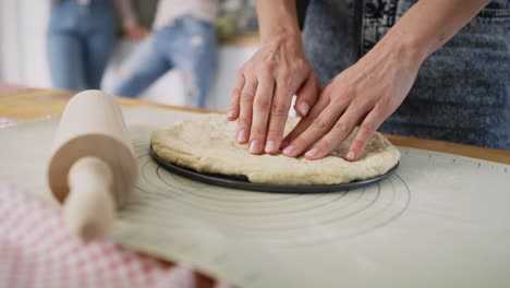 Zoom-in-video-of-forming-crust-for-a-homemade-pizza