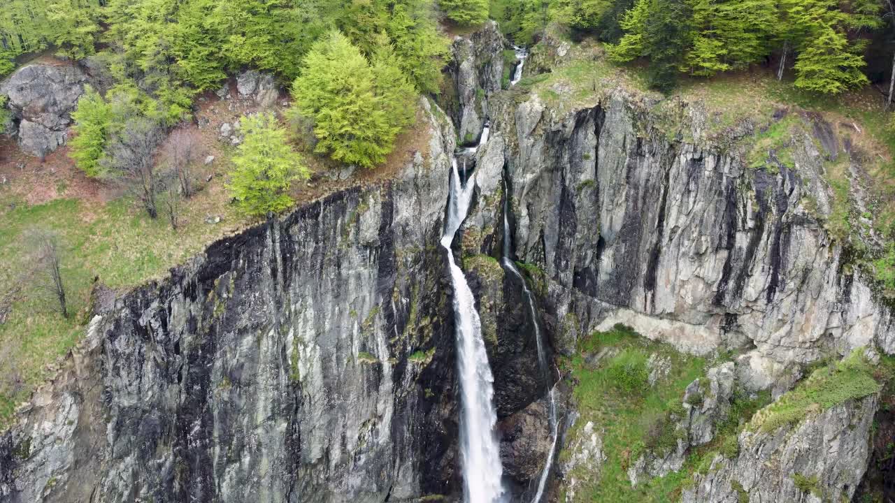 Aerial tilt-down view of Kademliya Waterfall's majesty in Bulgaria