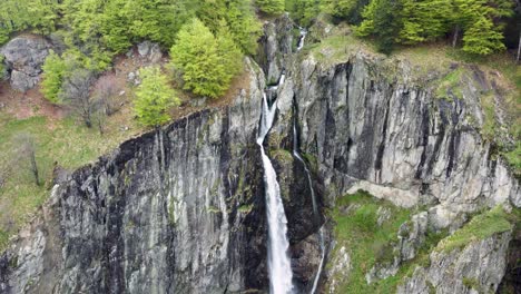 Aerial-tilt-down-view-of-Kademliya-Waterfall's-majesty-in-Bulgaria