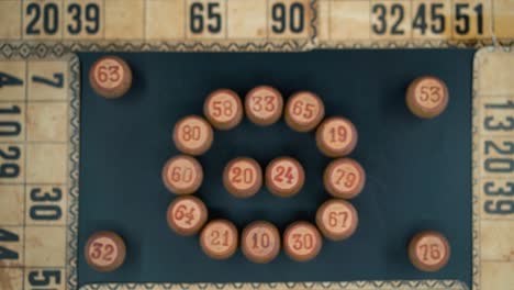 cinematic close-up smooth zoom in, shot from above of a bingo wooden barrels in a circle, woody figures, old numbers background, vintage board game, professional lighting, slow motion 120 fps