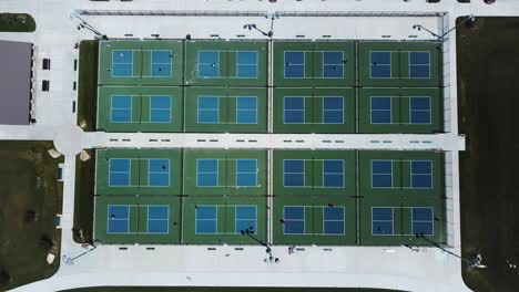 drone shot directly above 16 pickleball courts