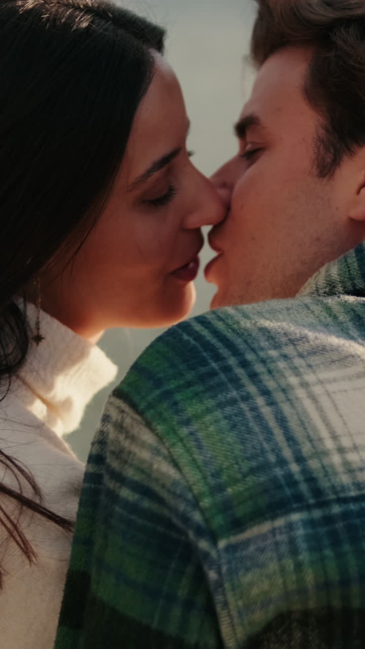 Couple's Kiss by the River in Seville