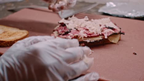 Preparing-pastrami-sandwich,-meat-and-bread,-close-up