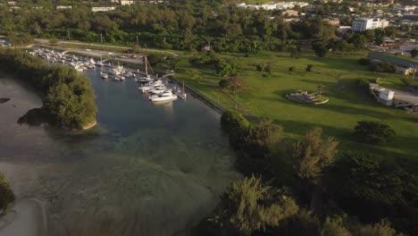 aerial view of parked yachts at american memorial park during golden hour