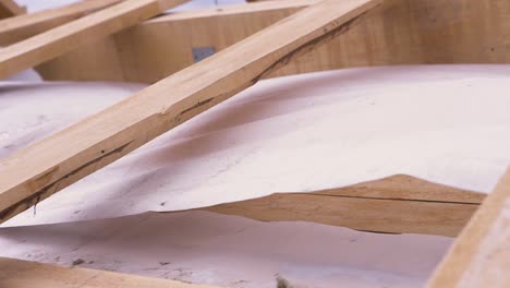 close-up view of wooden roof framing with underlayment