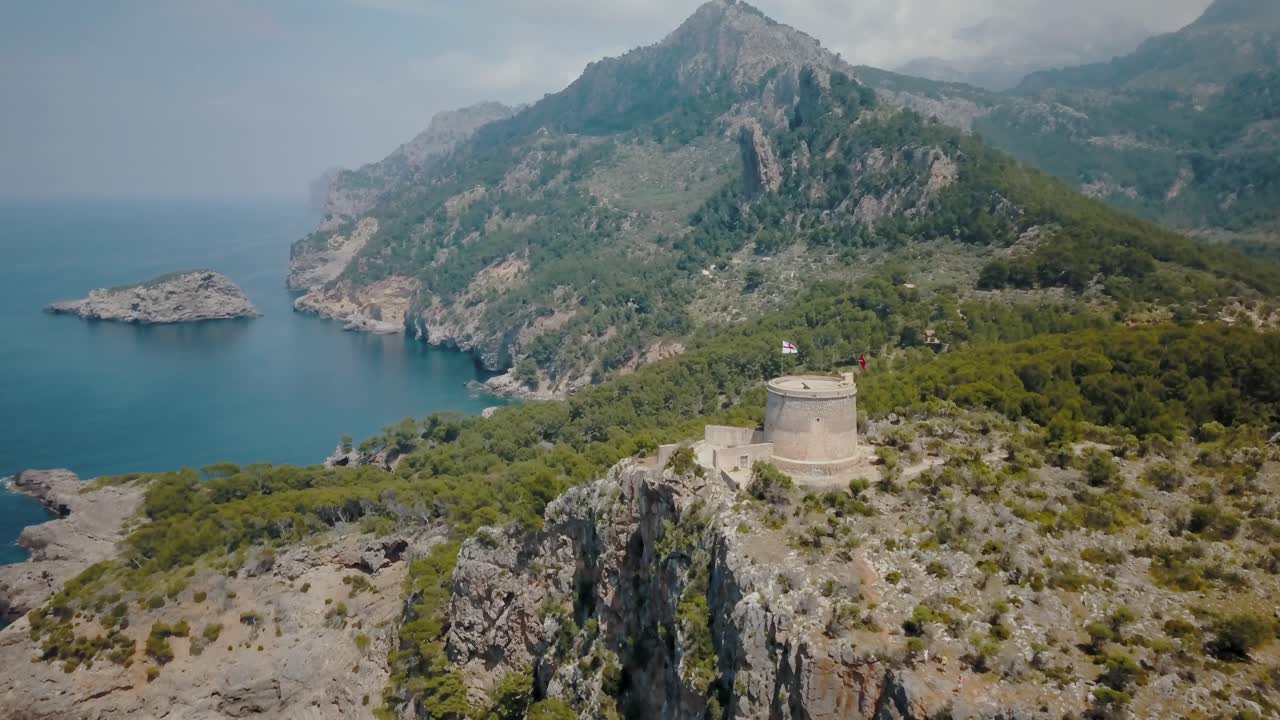 Beautiful aerial view in 4k of the Serra de Tramuntana - Westcoast coastline Mallorca - Sunny warm day near Port de Soller