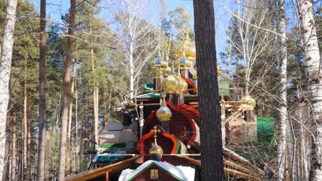 wooden orthodox church in a forest