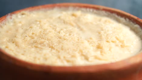 aromatic creamy indian dessert in a clay pot