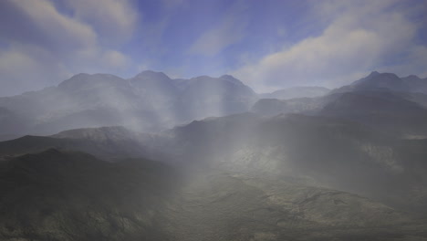 stunning mountain landscape with mist and sunlight during the day