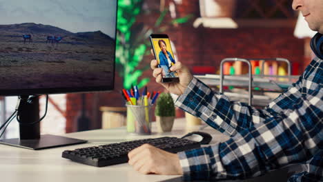 man at home having fun looking at social media reels done by content creators