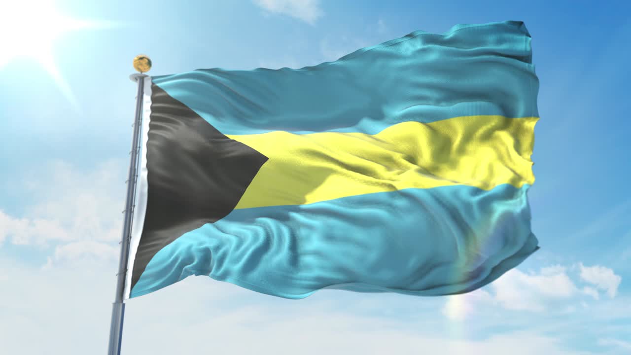 Flagge der Bahamas weht im Wind vor tiefblauem Himmel. Nationales Thema, internationales Konzept. 3D-Render, nahtloser Loop 4K