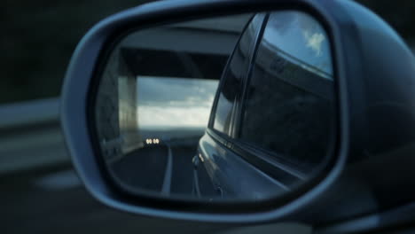 looking back in the side review mirror