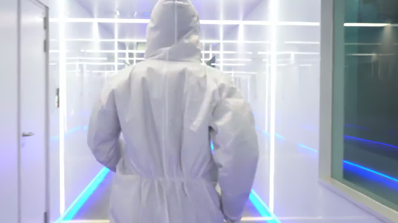 Scientific researchers and technicians with face mask, lab coat rush for epidemic prevention material equipment at laboratory