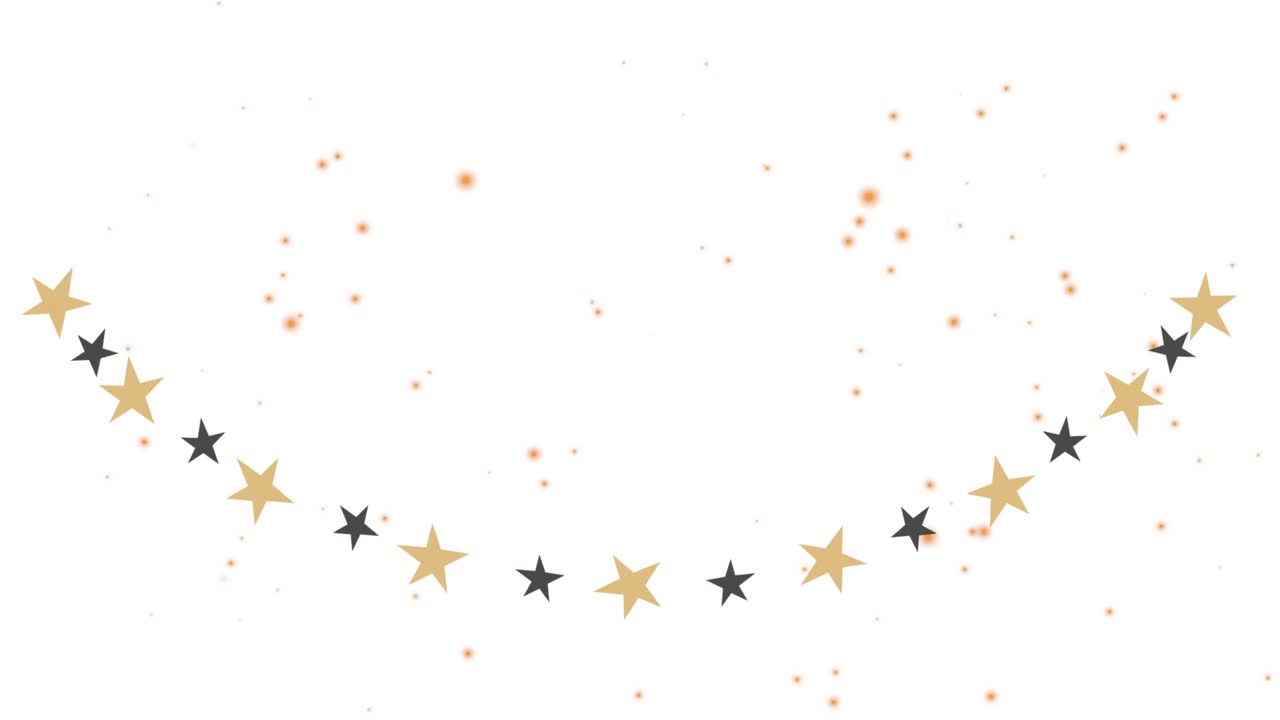 Puntos naranjas brillantes que aparecen sobre una guirnalda dorada y negra con estrellas que se mueve creando destellos.