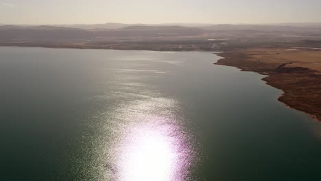 aerial view of a lake in a desert landscape