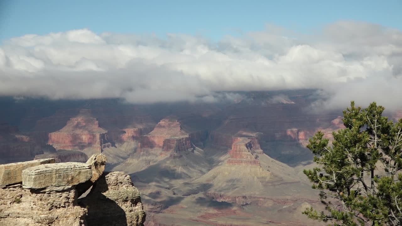 A static shot of clouds passing over the Grand Canyon