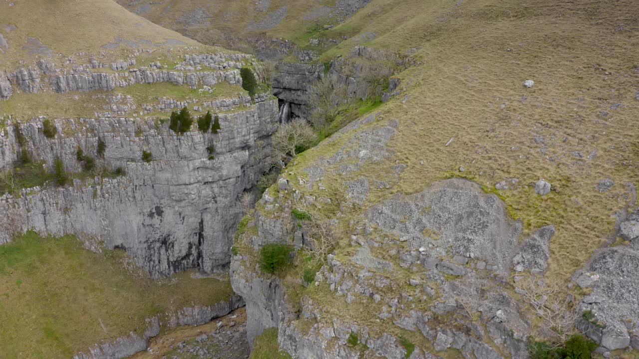 Aeriel footage Gordale Scar is a limestone ravine near Malham, North Yorkshire, England