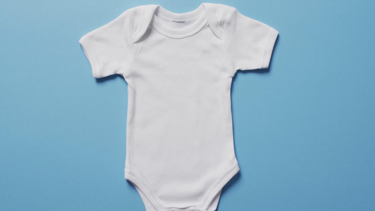 Video of whit baby grow with copy space on blue background