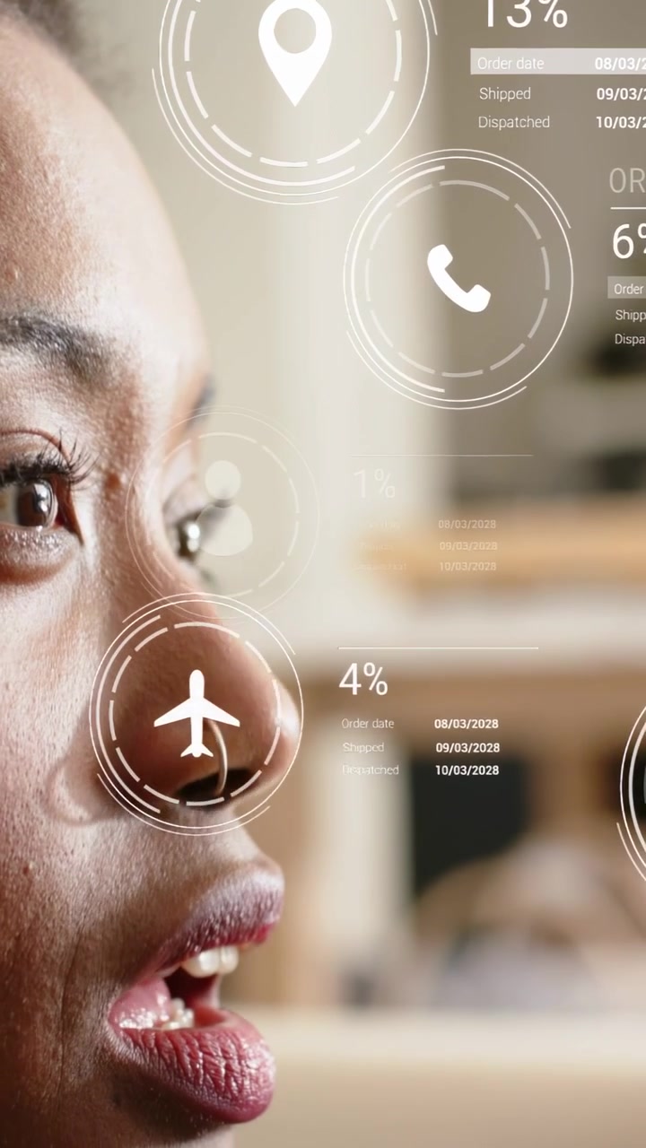 Woman sitting on couch tracking AR HUD moving across face, showing incoming order status, % rise