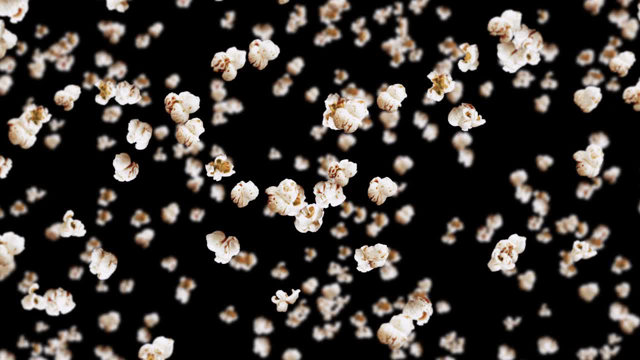 검은색 바탕에 많은 팝콘을 날려. 색 소금 팝콘. 건강한 음식. 옥수수 씨. 팝콘 회전의 3d 루프 애니메이션.