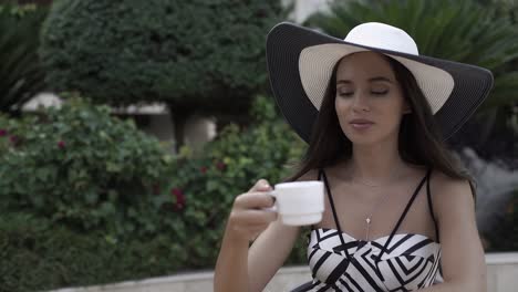 stylish woman in a garden