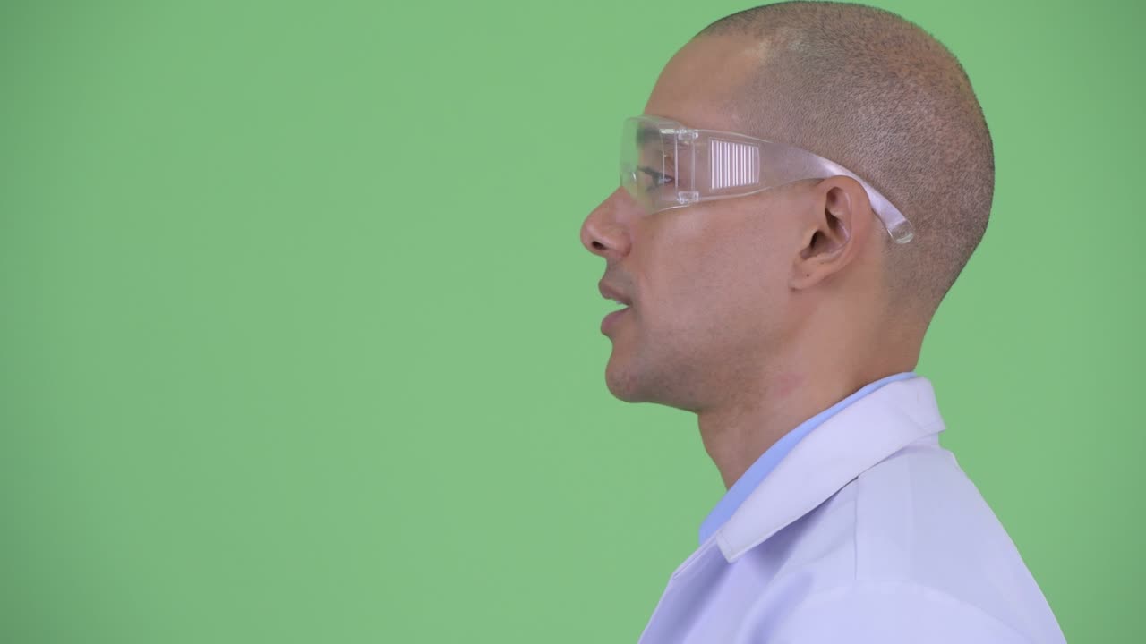 Happy bald multi ethnic man doctor as scientist