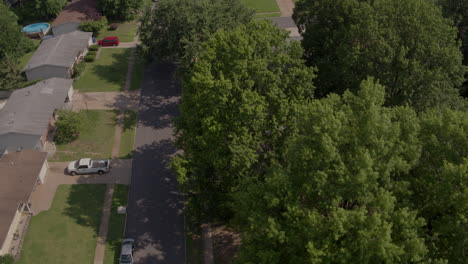 slow descent over suburban street and houses