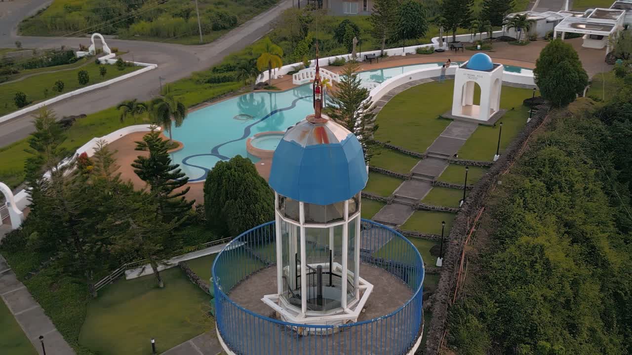 Close aerial circular motion near lighthouse at Tierra Alta Residential Resort