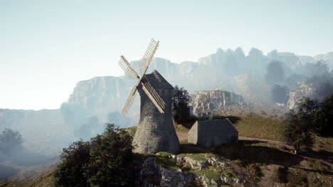 ancient windmill on a mountain ridge