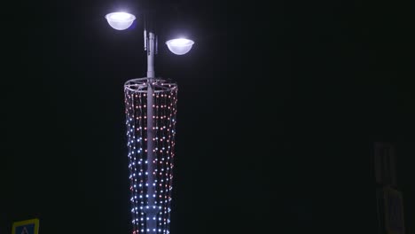 decorated streetlight at night