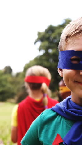 group of kids pretending to be a super hero