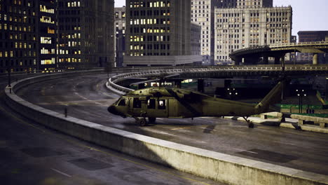 military helicopter landing on city highway at night