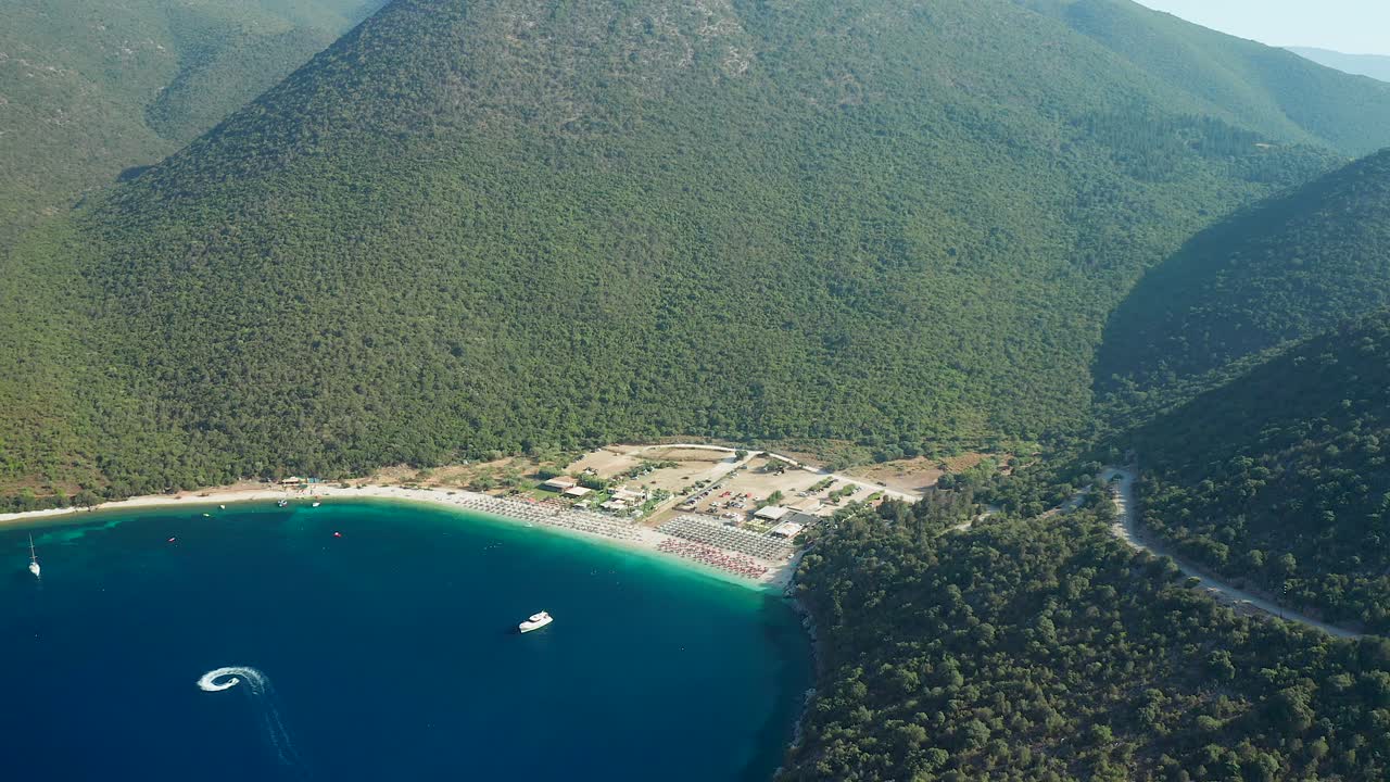 High flying view Beautiful Antisamos beach surrounded by vegetation, Kefalonia Island